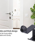 Rock Solid Stainless Steel Door Stopper With Hook, Wall Mounted Door Bumper For Home And Office, Black Finish next to open door