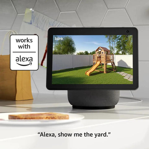 Tablet displaying backyard view captured by Outdoor Wireless Security Camera With Up To Two Year Battery Life, 1080p HD Live View.