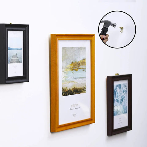 Picture Hanging Kit 220 Pieces Gold Hardware Set with Assorted Hooks displayed in frames on wall.