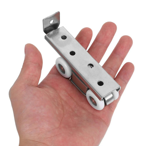 Heavy Duty Stainless Steel Sliding Door Track With Silent Nylon Four Wheel Pulley System For Easy Bolt On Setup And Rolls Like Butter Closet Hardware Kit in hand