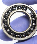 Close-up of Two Piece 6902 Thin Ball Bearings 15x28x7mm Rated For 500 Degree Heat for industrial use.