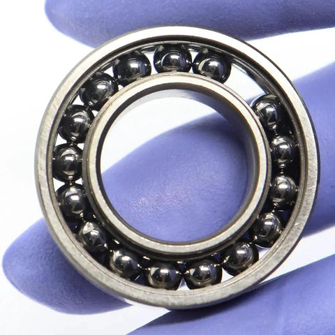 Close-up of Two Piece 6902 Thin Ball Bearings 15x28x7mm Rated For 500 Degree Heat for industrial use.