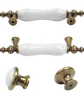 Slick Vintage Style Antique Bronze And White Crackled Ceramic Cabinet Pull And Knob Set Of Eight Pieces For Your Dreamy Kitchen Drawers With A Rock Solid Everyday Finish, featuring four pulls and four round knobs.