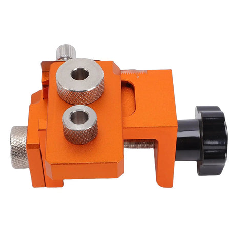 Rock Solid Double Hole Drilling Positioner With 12mm Eccentric Nut Drill Guide, orange aluminum body with silver knobs for woodworking.