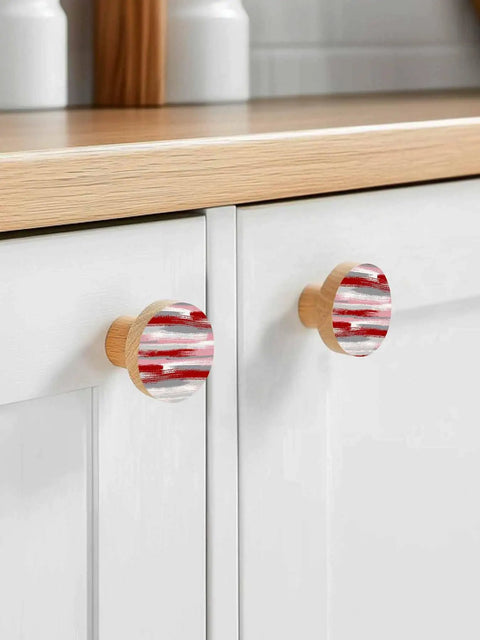 Rock Solid One Point Four Inch Round Beech Wood Cabinet Knobs Featuring A Snazzy Abstract Red Oil Painting Vibe For Total Kitchen Furniture Upgrades Today on white drawers.