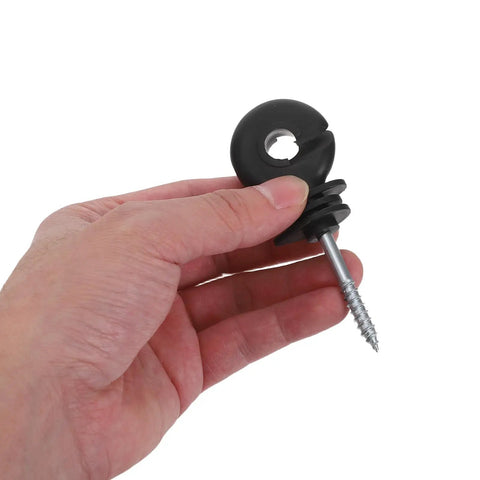 Hand holding Heavy Duty Electric Fence Wire Insulators For Wood Posts With Socket Installation Tool Easy Plug And Play Holding Insulators For Cattle Made Of PP PE And Carbon Steel Black For Farm Use