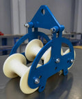 Industrial Grade Cable Pulley Roller Guide Assembly For Heavy Duty Routing On Assembly Lines Built Tough As Nails With Carbon Steel Construction Three Wheel Wellhead Tool Featuring 160 And 60 Mm Specs, blue three-wheel carbon steel cable pulley guide