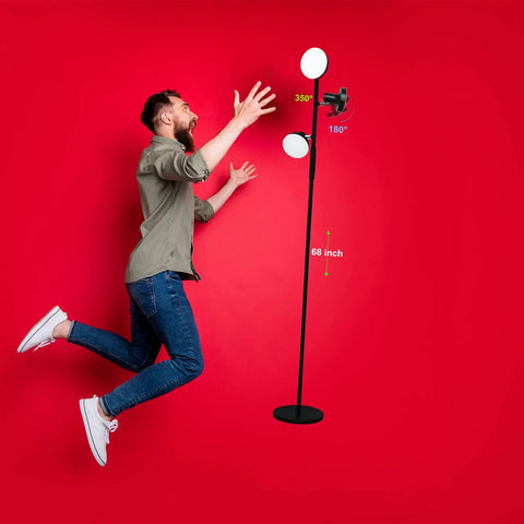 LED Tree Floor Lamp With 3 Adjustable Rotating Heads And Stepless Dimming next to a man against a red background.