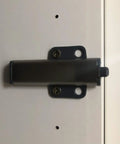 Easy Push To Open Drawer Hardware Set Of 3 Slick Cabinet Touch Latches with smooth finger flick release installed on a cabinet.