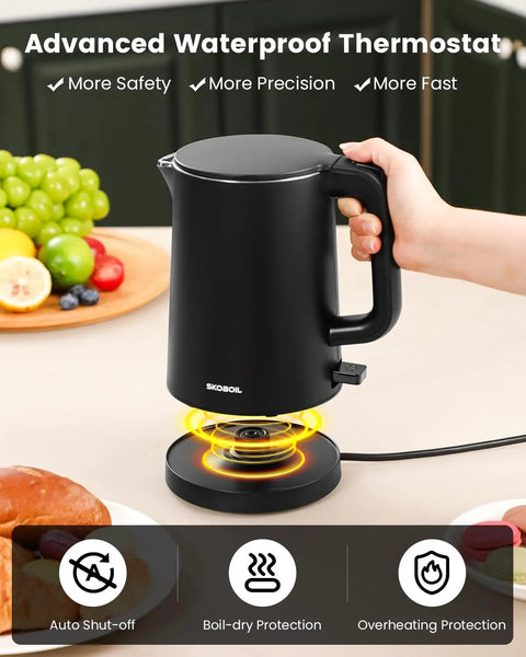 Person using Compact Electric Kettle For Tea And Coffee 0.8L 27 Oz Double Wall Stainless Steel Space Saving Mini Hot Water Heater with Auto Shut Off