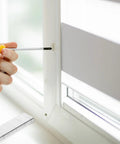 Person using a screwdriver for window repair with Heavy Duty 40 Piece Shutter Repair Kit With Corrosion Resistant Stainless Steel Staples Plus Tilt Rod Louver Pins For No Sweat Window Fixes That Really Get The Job Done Right.