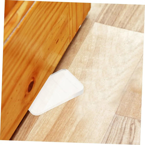 Clear Plastic Leveling Shims For Furniture Wobble Fix 32 Piece Wedge Set stabilizing wooden furniture on uneven floor.