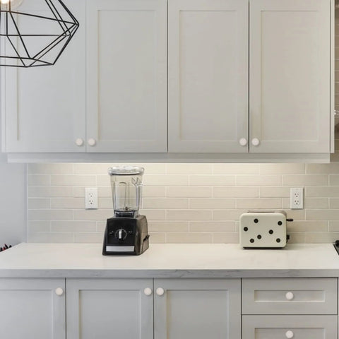 Modern kitchen with white cabinets featuring 10 Pack Brushed Satin Nickel Cabinet Knobs 1.2 Inch Round Drawer Knobs For Cabinets And Drawers.