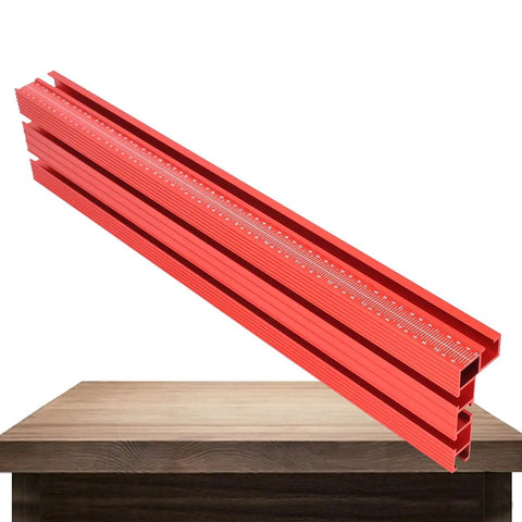 Built Tough Aluminum T Track Table Fence System With Laser Measure For Dead Accurate Miter Saw Cuts And Woodworking Projects On Portable Or Cabinet Saws on a wooden table, showcasing the red aluminum track.