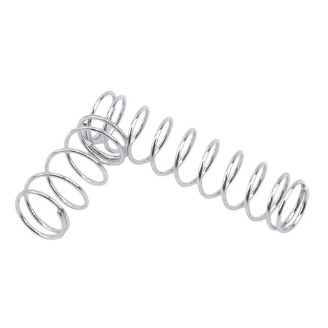 Close-up of a steel spring from the 200 Piece Tension And Compression Spring Set With Storage Box For Repairs Heavy Duty Elasticity