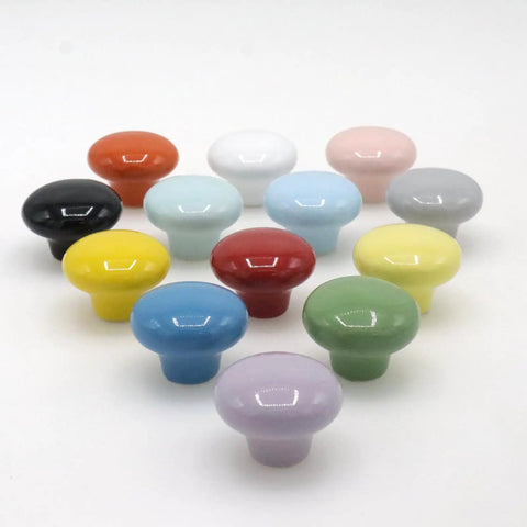 Top Shelf 10 Pack Ceramic Cabinet Knobs And Drawer Pulls In Sweet Sky Blue Featuring Hella Durable 32mm Round Design With Complete Mounting Hardware For A Fresh Kitchen Bedroom Makeover - colorful ceramic knobs arranged.