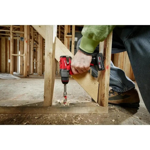 Built Tough Compact 1/2 Inch Cordless Drill Driver Kit slick operation used to drill into a wooden beam at a job site.
