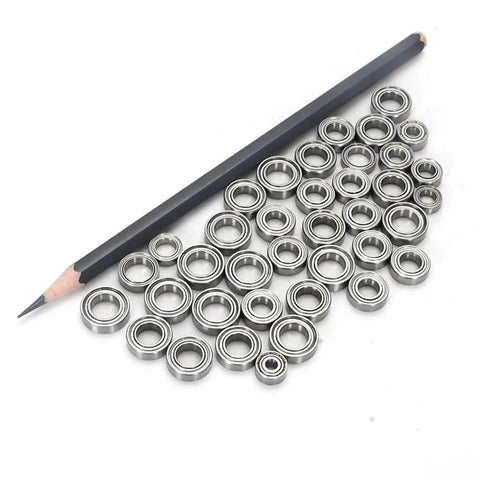 Premium Stainless Steel Deep Groove Ball Bearings Miniature Smr63zz arranged next to a pencil, showcasing size and quality.