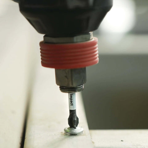 Bosch Phillips #2 impact screwdriver bit installed in a drill chuck with red collar