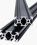 Close-up of Badass 2040 T-Slot Aluminum Extrusion Profile with sleek anodized finish, showing two 1000mm black rails.