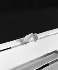 Close-up of latch on Fits 16x25 Duct Opening Return Air Grille With Filter Included And Removable Door Steel White Vent Cover