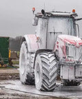 Tractor covered in foam from Touchless Heavy Equipment Cleaner One Step Detergent Soap Concentrate Foam For Construction Gear And Work Trucks No Brushing Commercial Grade Auto Foam Cleaner Dilutable Easy Rinse One Gallon