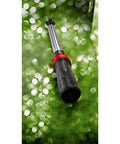 Three-Eighths Inch Drive Microtork Torque Wrench on green background, 25 to 250 inch-pounds range, black finish with easy read scales