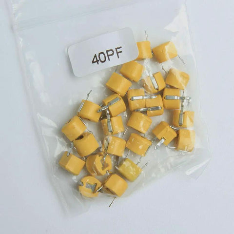 Awesome 45 Piece 6Mm Trimmer Capacitor Kit Featuring Nine Separate Values For Quick Radio Circuit Adjustments And Totally Hassle Free Weekend DIY Repair containing yellow 40pf capacitors in a plastic bag.