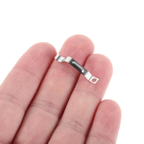 Rock Solid Metal Push Button Spring Clip For Zero Hassle Umbrella Repair And Patio Sun Shade Replacement Quick Swap Switch Assembly held in hand.