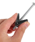 Hand holding Beefy Drywall Anchor Kit with toggle bolts and wing nuts galvanized iron fasteners for furniture and machinery