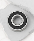 Heavy Duty Lawn Mower Ball Bearings 20X47X14mm 4 Pack Precision Replacement Kits For John Deere, close-up of a single bearing.