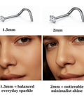 Implant Grade Titanium Nose Stud 20G With Dope Cubic Zirconia Sparkle and Lock Tight Corkscrew Design shown in 1.5mm and 2mm sizes on model.