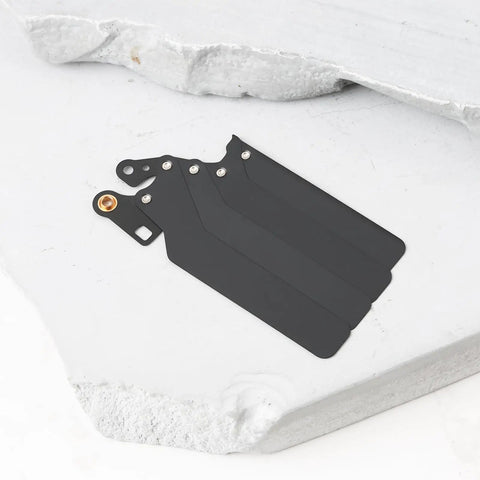 No Sweat Shutter Blade Replacement Kit For Canon Dslr Repair with four black precision blades on a white surface.