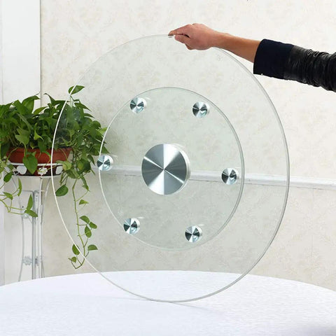 Thickened 12mm Tempered Glass Lazy Susan Turntable with a smooth swivel action being held above a table.