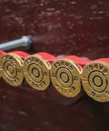 Killer Rustic Western 12 Gauge Shotgun Shell Bar Pulls For Cabinets And Drawers Hella Tough Ammo Casing Hardware Pack Of Four on dark wood