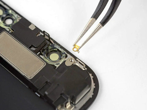 Placing component in device using Essential Electronics Toolkit for DIY Home and Tech Repairs with Magnetic Bit Screwdriver