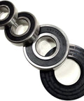 Bearing And Seal Kit Fixes Whirlpool Front Load Washer Tub GHW9100LQ2 showing three steel bearings and one rubber seal.
