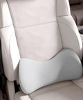 High Density Memory Foam Lumbar Support Cushion For Dodge Charger Seats on a beige car seat, designed for comfort and back support.
