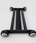 Kickass Core Training Apparatus Featuring Solid Tube Frame Design with heavy-duty black rolling wheels for stability.
