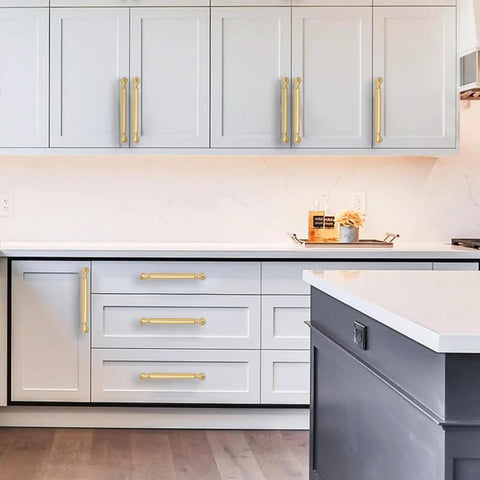 10 Pack 5 Inch Hole Center Brushed Gold Cabinet Pulls on gray kitchen cabinets with smooth satin finish.