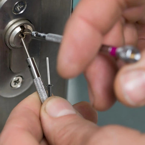 Close-up of person using 50Pcs Black Aluminum Round Head Blind Rivets With Flange M4x25mm Long Grip in a DIY repair project.