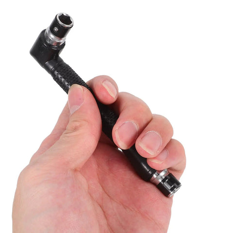 Compact Mini Ratcheting Wrench And Socket Tool Kit Tough As Nails Steel Spanners in hand, showcasing ergonomic design for repairs.