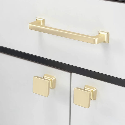 Sweet 10 Pack 5 Inch Brushed Brass Kitchen Cabinet Handles Gold Toned Drawer Pulls Featuring Smooth Edges For Cupboards And Home Cabinetry Upgrades 128mm Easy Mount shown on white cabinetry.