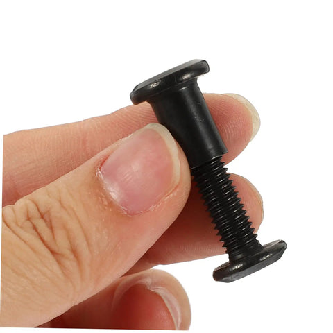 Tough As Nails M6x25 Stainless Steel Binding Post Screws For Leather Bags And Saddle Work shown in hand, detail of black socket cap.