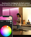 Hue LightStrip Plus Dimmable LED Smart Light Extension for Ambient Mood Lighting in modern kitchen controlled via smartphone app