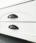 Two white kitchen drawers featuring 10 Pack 3 Inch Matte Black Cabinet Cup Pulls Solid Zinc Alloy Build.