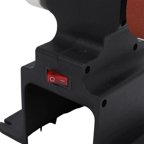 Top Tier Mini Bench Grinder With Versatile Grinding Wheels And A Rock Solid Copper Motor That Knocks Out Polishing Rust Removal And Sharpens Hand Tools Like A Dream power switch close-up on the mini bench grinder.