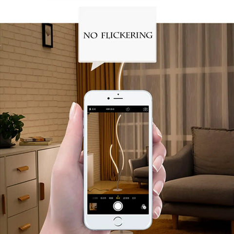 LED Floor Lamp Dimmable With Remote Control Space Saving Spiral Design shown on phone screen in modern living room.