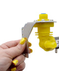 Person holding Ice Machine Water Valve Replacement IH9124 000009124 with brackets, 220-240V, 50/60Hz, 6W, 2.64 GPM