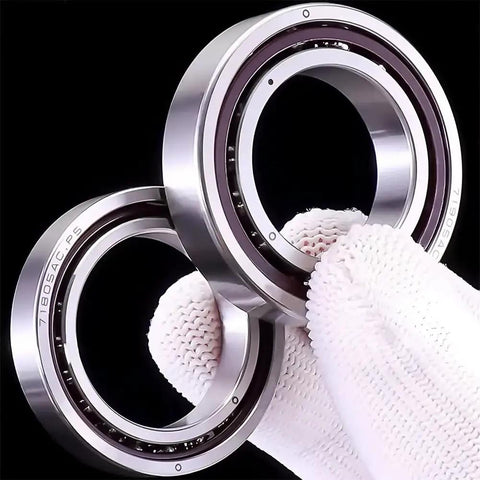 One Pair 71918Ac P4Db Angular Contact Ball Bearings 90 Mm X 125 Mm X 18 Mm, held with gloves for precision installation.
